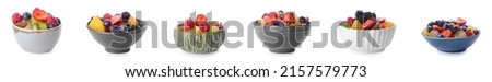 Set of bowls with tasty fruit salads on white background Royalty-Free Stock Photo #2157579773