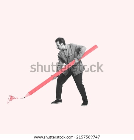 Writer, artist, creator. Young man holding huge drawn pencil and writing isolated on light background. Concept of art, creativity, retro style, surrealism. Copy space for ad. Contemporary art collage Royalty-Free Stock Photo #2157589747