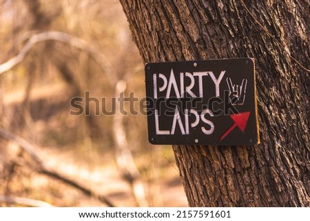 A shot of a sign in a forest