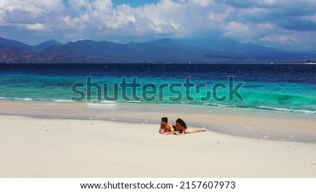 A picture of Russian partners on a holiday in Gili Meno, Lombok, Indonesia, Asia during a daytime