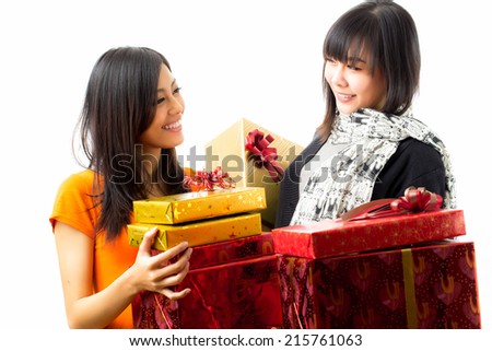 Asian woman celebrating christmas shooting in white background