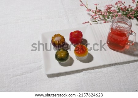 tteok, Korean traditional snack, rice cake, jeolpyeon, mochi, dessert, colorful rice snack with white background  Royalty-Free Stock Photo #2157624623