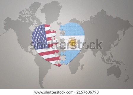 puzzle heart with the national flag of united states of america and argentina on a world map background. Concept. 3D illustration