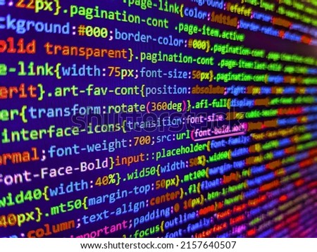 Programming code screen of software developer. Programmer Typing New Lines of HTML Code. Php code on blue background in code editor.  