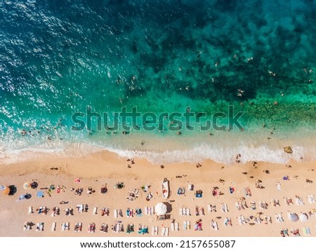 Drone footage of people sunbathing on Kaputaş beach near Kalkan - Kaş, Antalya, Turkey Royalty-Free Stock Photo #2157655087