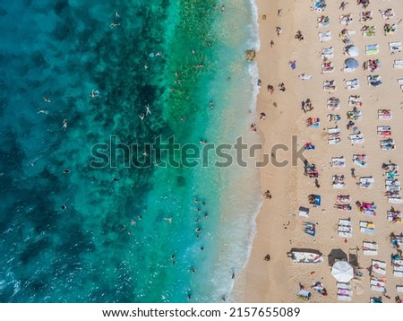 Drone footage of people sunbathing on Kaputaş beach near Kalkan - Kaş, Antalya, Turkey Royalty-Free Stock Photo #2157655089