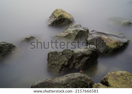 abstract composition of rocks and water