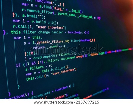 Code of javascript language on white background. Front-end applications in the color concept. Developer working on source codes on computer at office. Real Html code developing screen