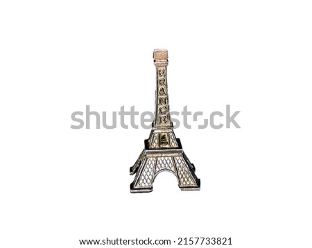 Miniature Eiffel Tower isolated on white