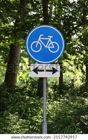 blue road sign bike path