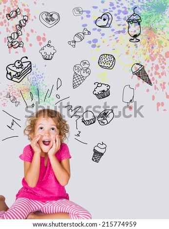 5 year old girl greedy for sweets Royalty-Free Stock Photo #215774959