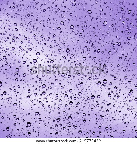 Water drop on glass - windshield rain colorful