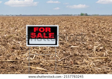 Farmland for sale. Agriculture real estate market, farm ground value and price concept.