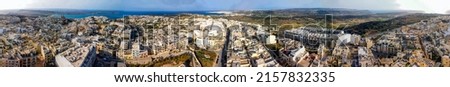 Aerial view of Mellieha cityscape from drone, Malta.