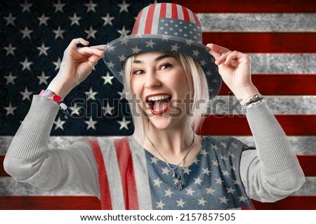 Happy young woman dressed in american flag clothes on american flag background. Celebrating the independence day of USA. Thanksgiving Day. Memorial Day
