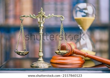 Legal office of lawyers, justice and law concept : Retro balance scale of justice on a desk in a courtroom, depicting giving fair and objective consideration to all evidence, without showing bias. Royalty-Free Stock Photo #2157860123