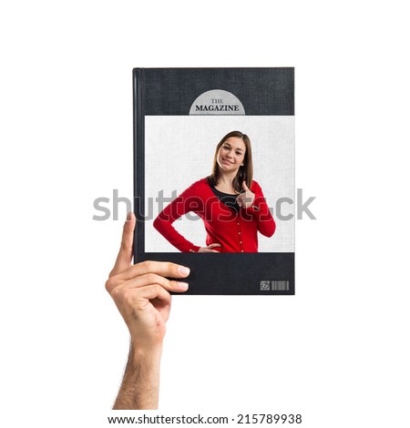 Young woman making Ok sign printed on book