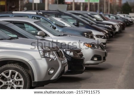 cars on the outside in the parking lot Royalty-Free Stock Photo #2157911575