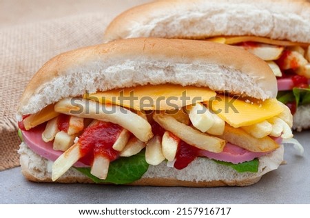 South African submarine sandwich with chips and meat known as a Gatsby Sandwich

 Royalty-Free Stock Photo #2157916717