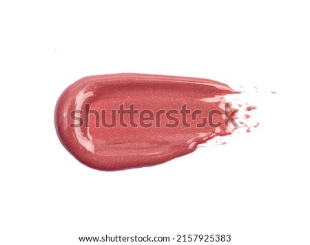 Lipstick swatch isolated on white background. Red lip gloss swipe