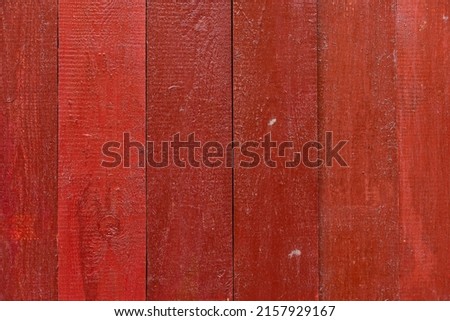 Rustic Old Weathered Red Wood Plank Background extreme closeup