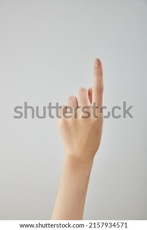  A front view of hand posing in white background for cosmetic advertising