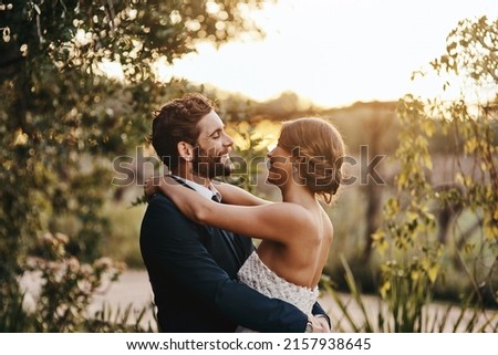 Im so happy that I met you. Shot of a happy young couple standing together on their wedding day. Royalty-Free Stock Photo #2157938645