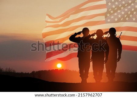 USA army soldiers saluting on a background of sunset or sunrise and USA flag. Greeting card for Veterans Day, Memorial Day, Independence Day. America celebration. 3D-rendering. Royalty-Free Stock Photo #2157962707