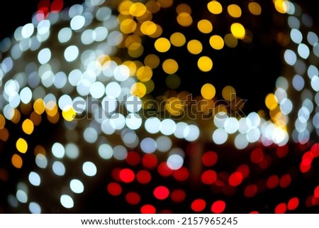 Blur chirstmas lights in the street Royalty-Free Stock Photo #2157965245
