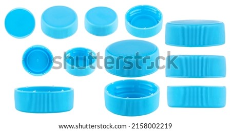 Blue caps for bottles, different sizes. Set of blue caps isolated on a white background. Royalty-Free Stock Photo #2158002219