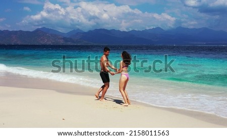 A shot of a Russian couple on a holiday in Gili Meno, Lombok, Indonesia, Asia