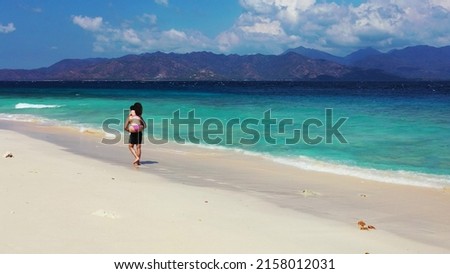 A shot of romantic Russian lovers on vacation in Gili Meno, Lombok, Indonesia, Asia