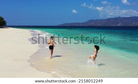 A picture of a Russian couple enjoying their time on a vacation in Gili Meno, Lombok, Indonesia, Asia