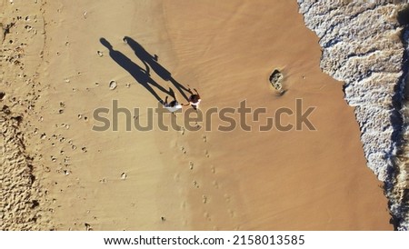 A high view shot of a Russian couple enjoying their time on a vacation in Gili Meno, Lombok, Indonesia