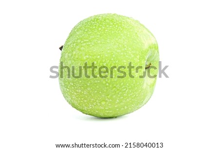 fresh green apple with water droplets isolated on white background