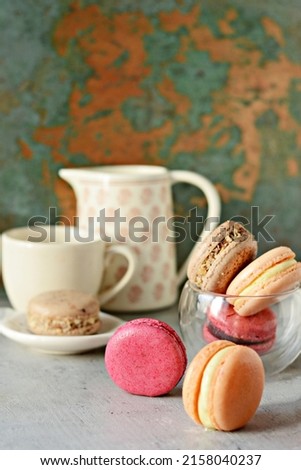  Colorful Almond macarons with various fillings. Small French cakes, tea time. 