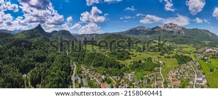 Bavarian town from above in the Alps, aerial view in spring