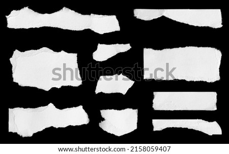a white piece of paper on a black isolated background Royalty-Free Stock Photo #2158059407