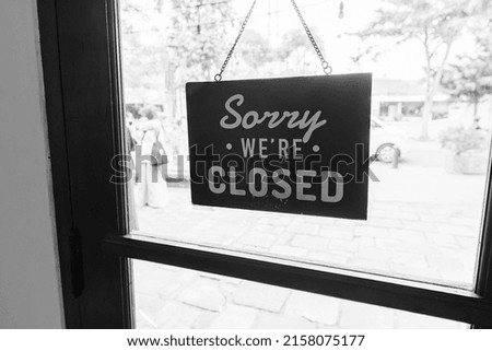 Closed Signage on Window Shop