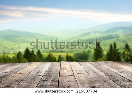 sunny day with landscape and terrace  Royalty-Free Stock Photo #215807734
