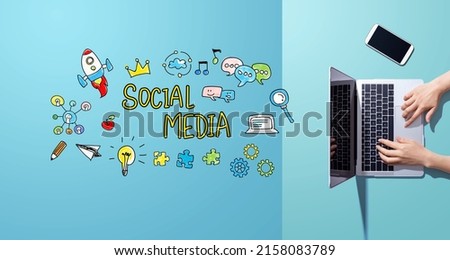 Social media with person working with a laptop