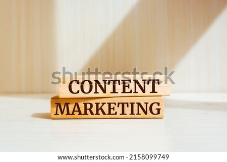 Wooden blocks with words 'Content Marketing'.
