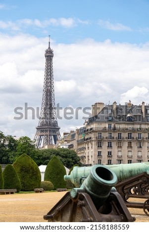 The famous Eiffel Tower in Paris, France under a cloudy sky Royalty-Free Stock Photo #2158188559