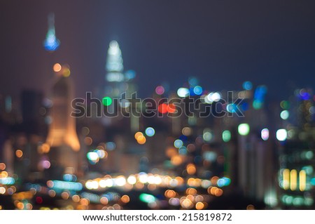 Blur image of Kuala Lumpur city with circle bokeh