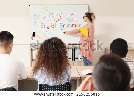 Students studying English grammar at language school Royalty-Free Stock Photo #2158256815