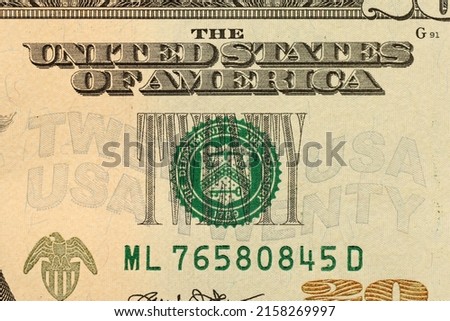 Macro shot with part of 20 US dollars bill. Twenty dollars banknote close up photo with high resolution. Money earnings, payday or tax paying period concept