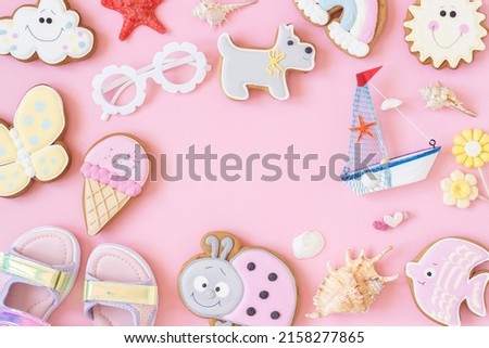 Bright creative layout made of cute summer symbols with copy space on pink background. Top view, Flat lay. Creative summer concept.