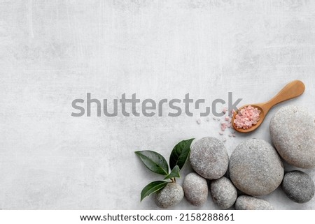 Relax background - spa stones with sea salt, top view