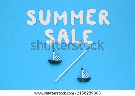 Summer Sale lettering, promotion decoration with nautical marine ornament on blue background. Two ship figures with percentage sign. Banner, poster sale or percent discount in the store. Mock up, flat