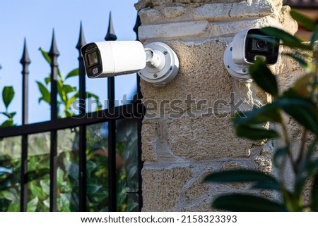 Futuristic security cameras scanning the street in 4K Royalty-Free Stock Photo #2158323393